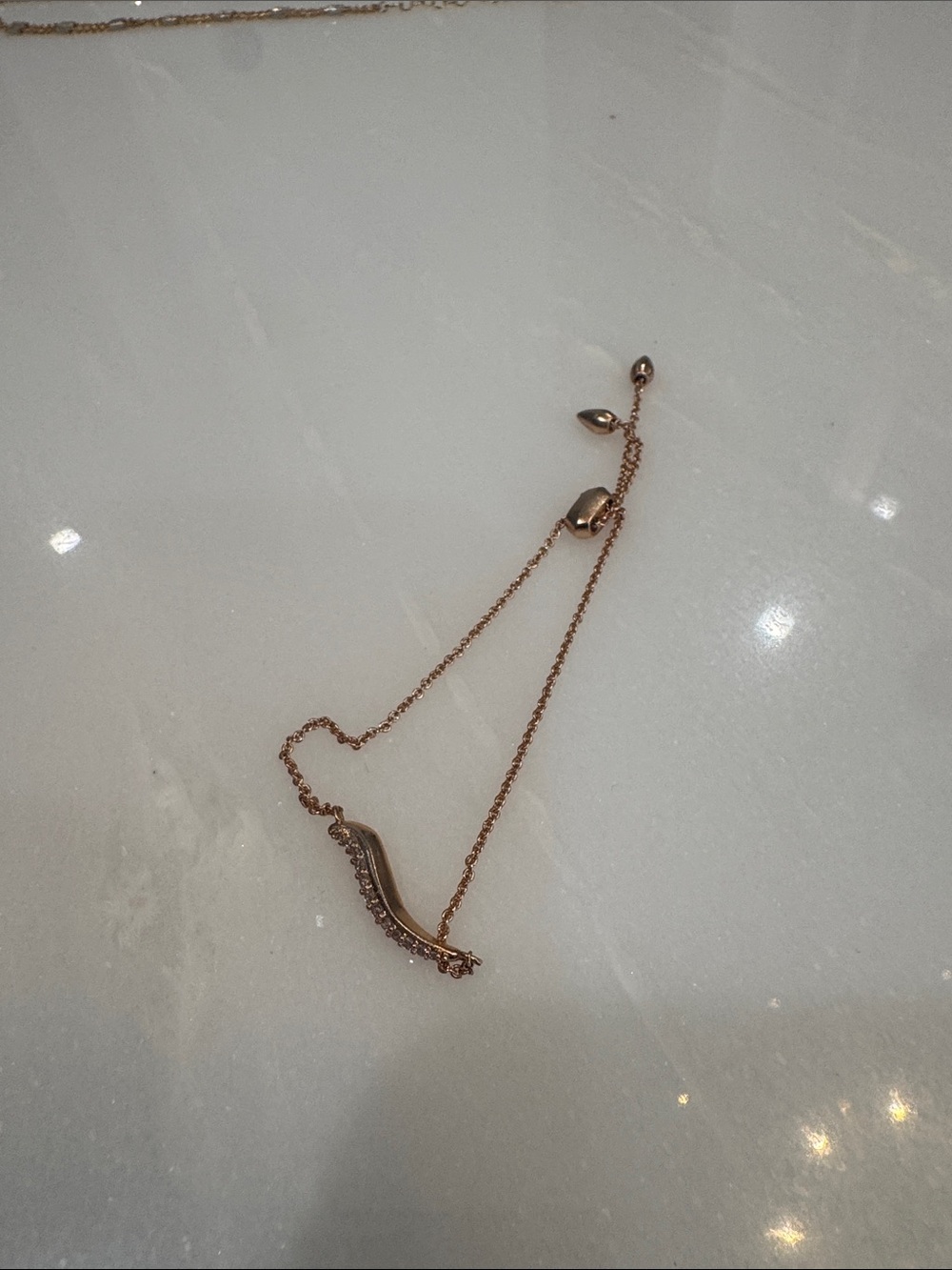 Kendra Scott Rose Gold Adjustable Chain Bracelet with Curved Bar